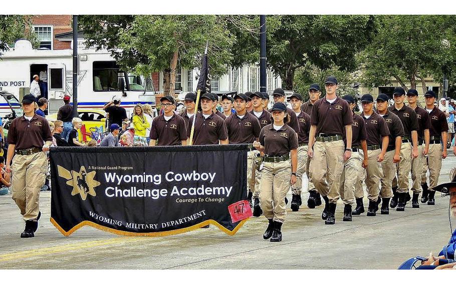Cadets from the Wyoming Cowboy ChalleNGe Academy march down a street as seen in this 2014 posting.