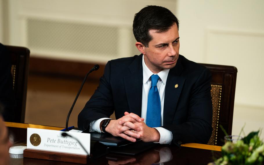 Transportation Secretary Pete Buttigieg attends a meeting of the White House Competition Council on Feb. 1, 2023.