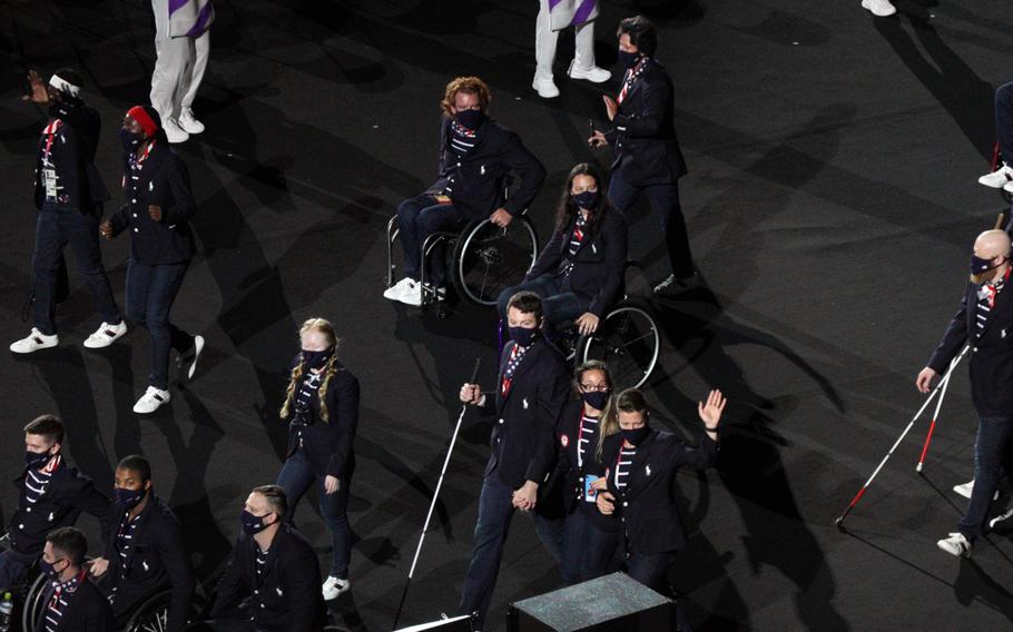 Members of Team USA parade into National Stadium during the Tokyo Paralympics' opening ceremony, Tuesday, Aug. 24, 2021.