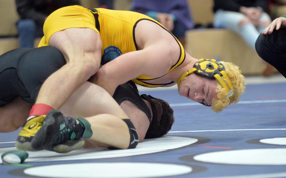 Stuttgart’s Christian Just, top, defeated William Pierce of Brussels in the 175-pound final at the high school 2022 Wrestling Tournament in Ramstein, Germany, Feb. 12, 2022.