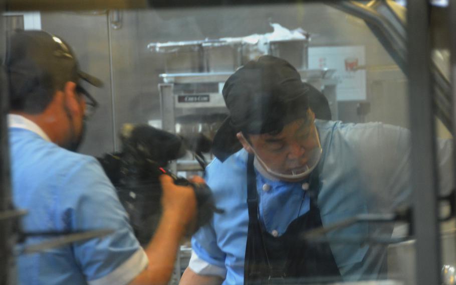 South Korean celebrity chef Baek Jong-won cooks  for U.S. and South Korean troops at the Provider Grill dining facility on Camp Humphreys, South Korea, June 28, 2022.