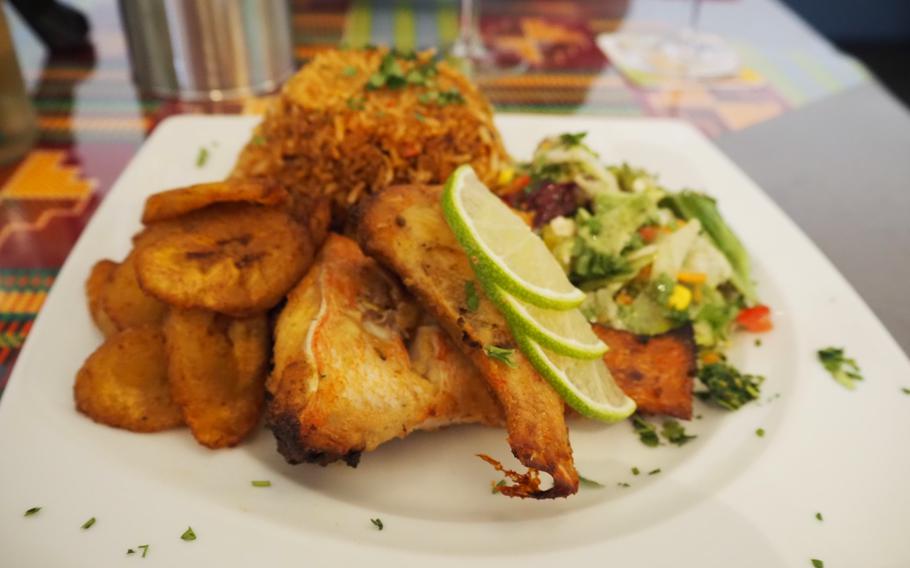 A plate of brightly colored grilled fish at Quagies in Kaiserslautern, Germany.