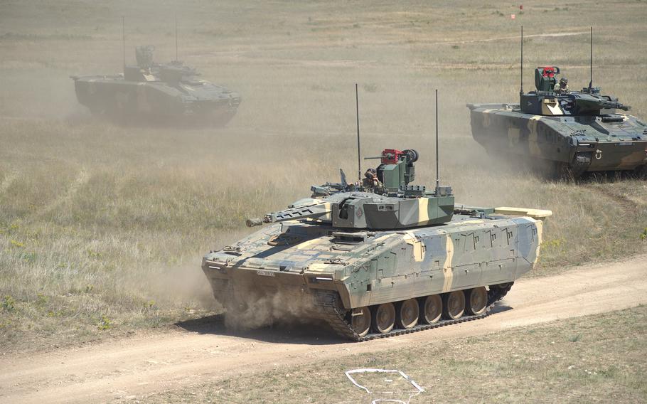 A Hungarian Lynx platoon moves across a firing and training range.