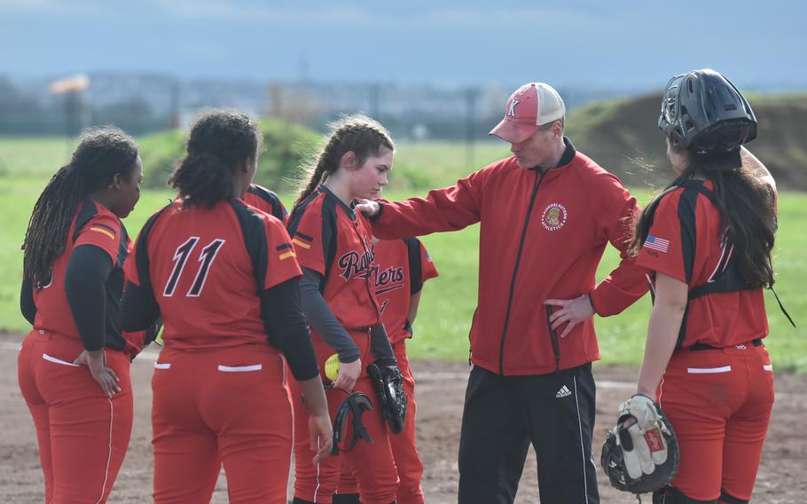 Kaiserslautern coach Zachary Robinson huddles with the team after the Raiders gave up a string of runs to Wiesbaden during the season opener on March 16, 2024 in Wiesbaden, Germany.