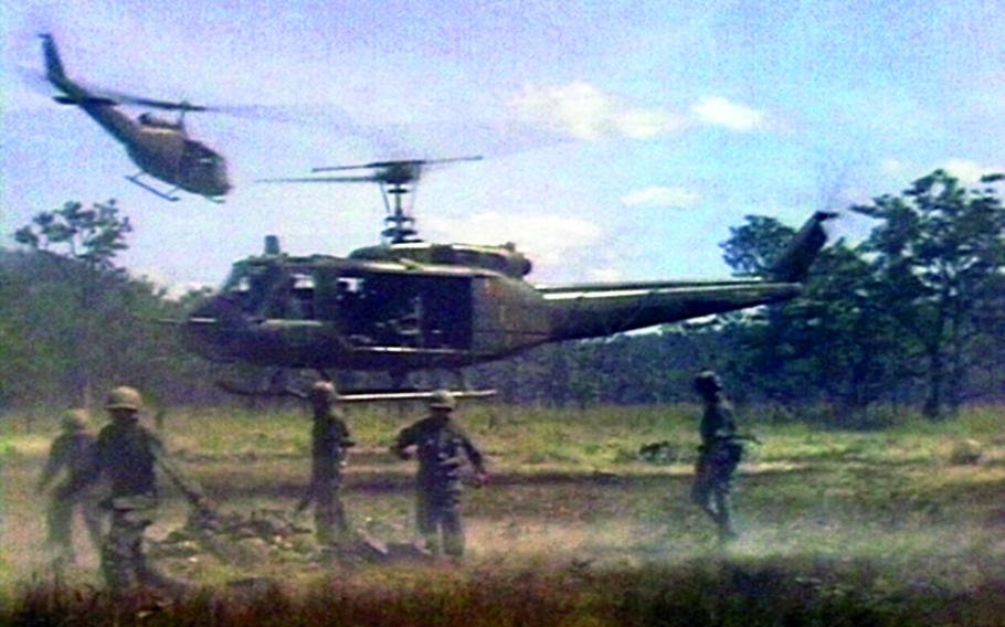 UH-1 aircraft of the 229th Assault Helicopter Battalion carry wounded 1st Battalion, 7th Cavalry soldiers away during the fight for LZ X-Ray in the Ia Drang Valley of Vietnam. Photo extracted from U.S. Army motion picture footage from November 1965.
