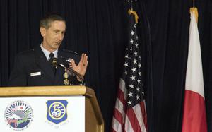 Lt. Gen. Kevin Schneider, outgoing commander for U.S. Forces Japan and 5th Air Force, speaks about threats to regional security during a change-of-command ceremony at Yokota Air Base in western Tokyo, Friday, Aug. 27, 2021. 