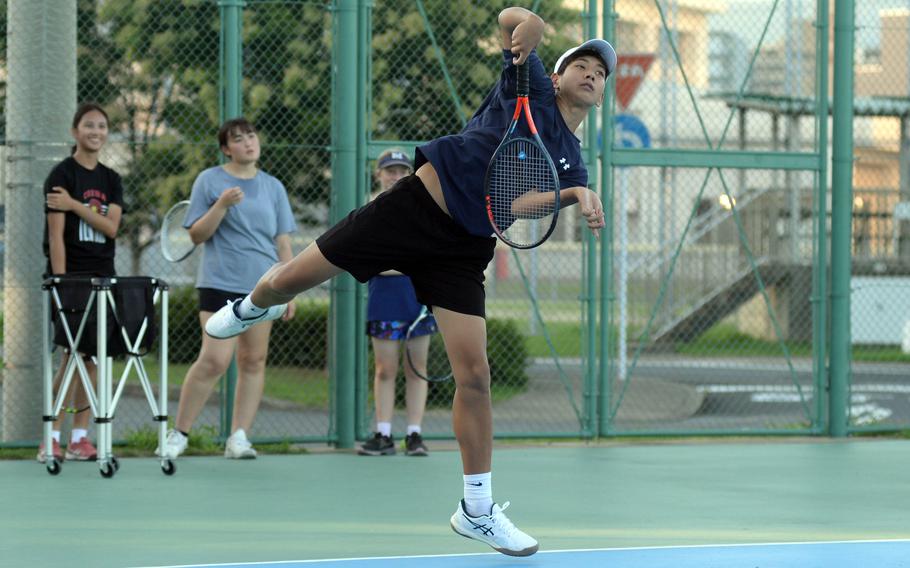 David Armstrong serves.