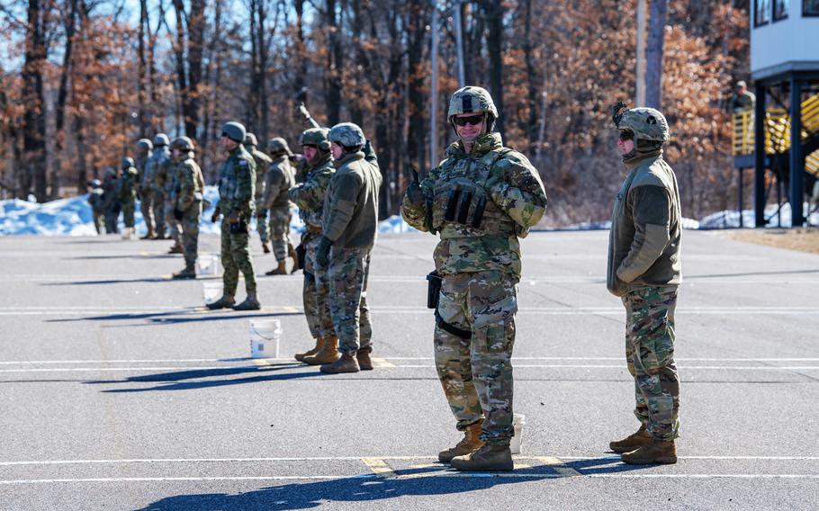 Fifteen Minnesota National Guard and two Croatian Soldiers shoot M4 and M17 weapons on April 8, 2022 while competing in Minnesota’s Best Warrior Competition at Camp Ripley.