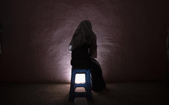 FILE - A Tigrayan refugee rape victim who fled the conflict in Ethiopia's Tigray sits for a portrait in eastern Sudan near the Sudan-Ethiopia border, March 20, 2021. A new study of medical records released Thursday, Aug. 24, 2023 shows that at least 128 women and girls were sexually assaulted in Ethiopia’s northern Tigray region even after a peace agreement ended a two-year conflict there. Most were sexually assaulted by multiple people, and almost all believe their attackers belonged to military groups. (AP Photo/Nariman El-Mofty, File)