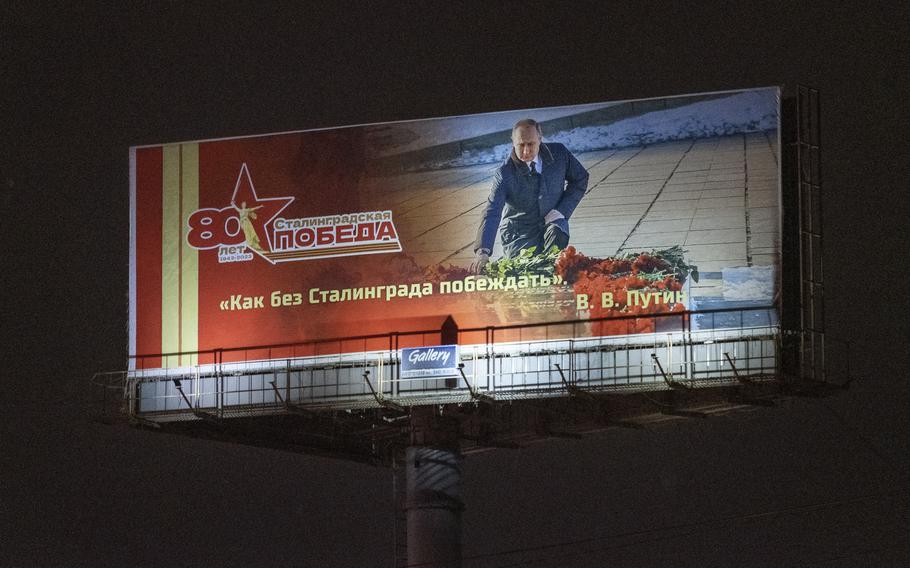 A huge billboard showing Russian President Vladimir Putin and his quote “How can we win without Stalingrad?” near the Motherland Calls monument, which Putin visited to place flowers, in Volgograd on Feb. 2, 2023. 