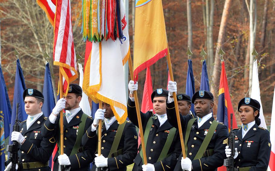 The 21st Theater Sustainment Command color guard stands on the parade field during the unit’s Veterans Day observance at Panzer Kaserne in Kaiserslautern, Germany, on Nov. 10, 2021.