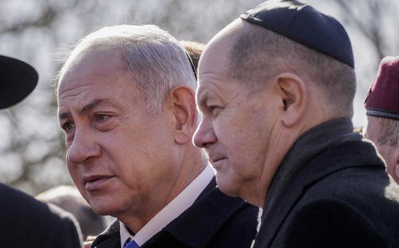 German Chancellor Olaf Scholz and Israel's Prime Minister Benjamin Netanyahu, from right, attend a ceremony at the 'Gleis 17' (Track 17) Holocaust memorial site in Berlin, Germany, Thursday, March 16, 2023. During the Holocaust the train station was one of the major sites of deportations of Berlin's Jewish community. (AP Photo/Michael Sohn)