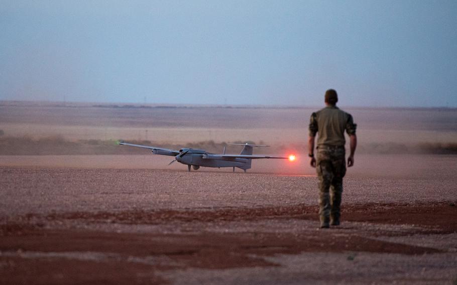 A member of the 33rd Special Operations Squadron JUMP 20 unmanned aerial vehicle team goes to retrieve the unmanned aerial vehicle at Melrose Air Force Range, New Mexico, May 17, 2022. The JUMP 20 is a vertical takeoff and landing UAV used to provide advanced multi-sensor intelligence, surveillance, and reconnaissance services, and the system can be set up and operational in less than 60 minutes without the need for launch or recovery equipment. 