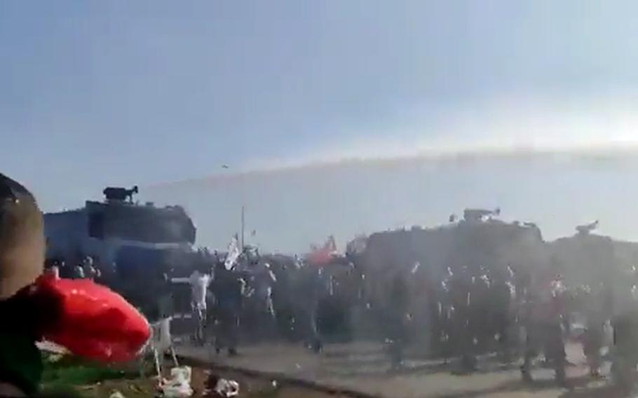 In a screenshot from social media, Turkish police use water cannons to disperse protesters at a pro-Palestinian rally Nov. 5, 2023, outside Incirlik Air Base, a U.S. installation in southeastern Turkey.