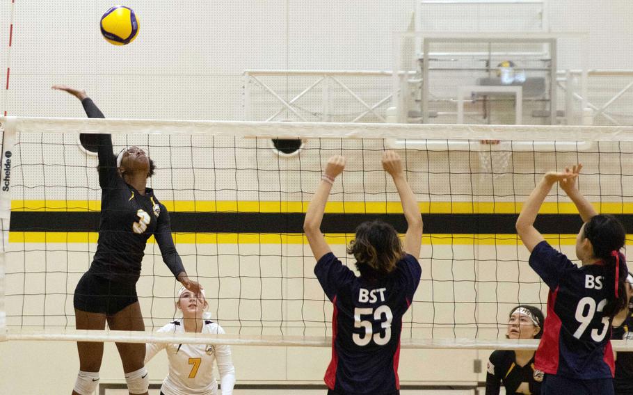 Kadena's Liza Young skies to spike against British School Tokyo during Thursday's American School In Japan YUJO Tournament match. The Panthers won in straight sets.