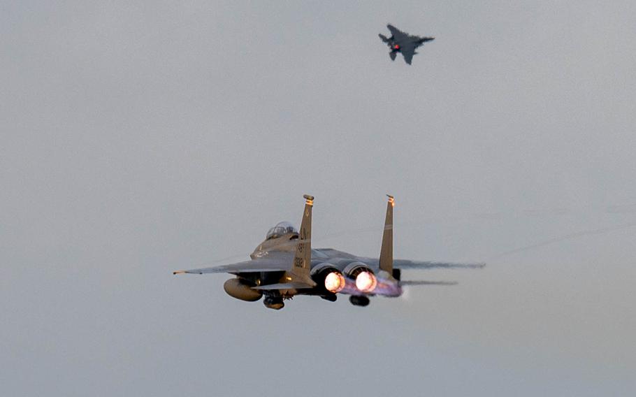 U.S. Air Force F-15E Strike Eagles assigned to the 494th Fighter Squadron take off from RAF Lakenheath, England, for a deployment to the Middle East on Oct. 16, 2023.