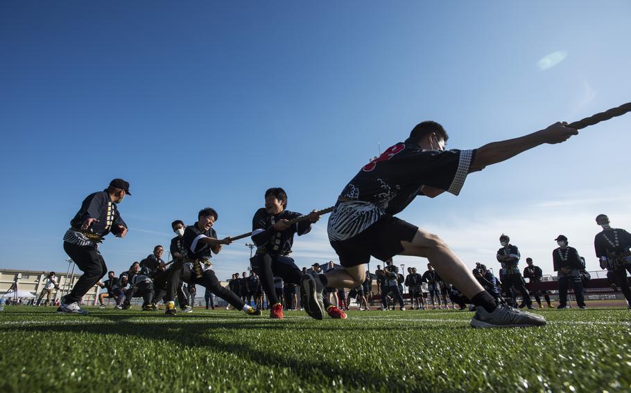 The Japanese team goes all in at tug of war on Sports Day at Marine Corps Air Station Iwakuni, Japan, on Oct. 28, 2022.