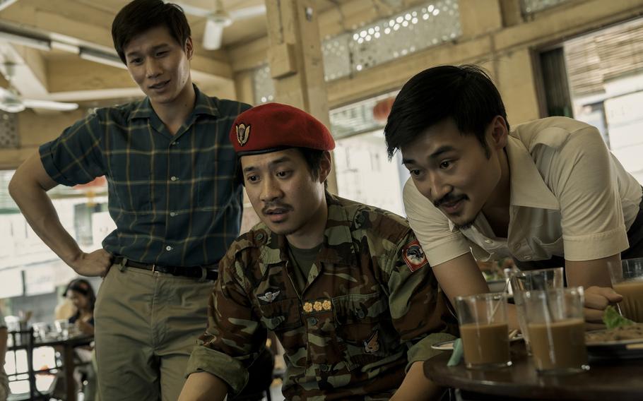 Australian actor Hoa Xuande, left, plays the Captain, a South Vietnamese spy for the North Vietnamese during the Vietnam War in “The Sympathizer.” His character is struggling with his communist leanings, having a fondness for the U.S. after studying there before the war. 