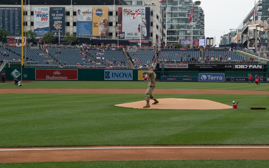 Lt. Gen. John B. Morrison Jr. throws out the ceremonial first pitch for U.S. Army Day at Nationals Park in Washington, D.C., on Friday, June 16, 2023. The Nationals hosted the Miami Marlins.
