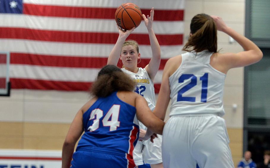 Wiesbaden’s Gwen Icanberry shoots a basket in the Division I championship game at the DODEA-Europe basketball championships in Ramstein, Germany, Feb. 18, 2023. The Warriors beat the Royals 43-34 to take the title.