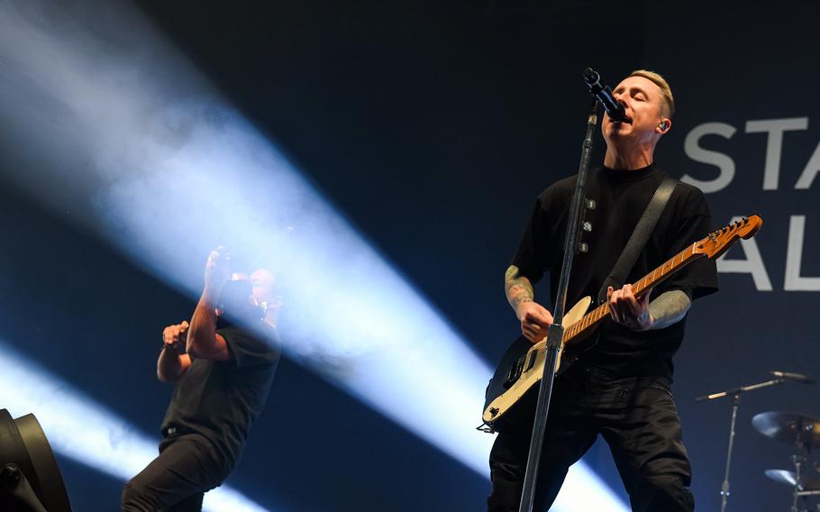 Yellow Card performs during a concert.