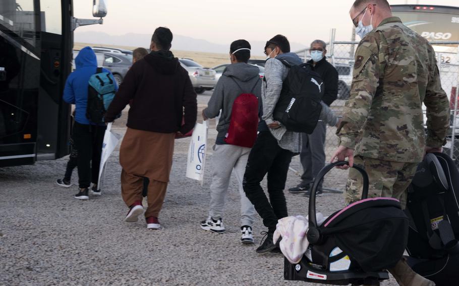 Afghan families with assistance from Lt. Col. Justin Wolthuizen at Holloman Air Force Base, N.M., Oct. 14, 2021. 