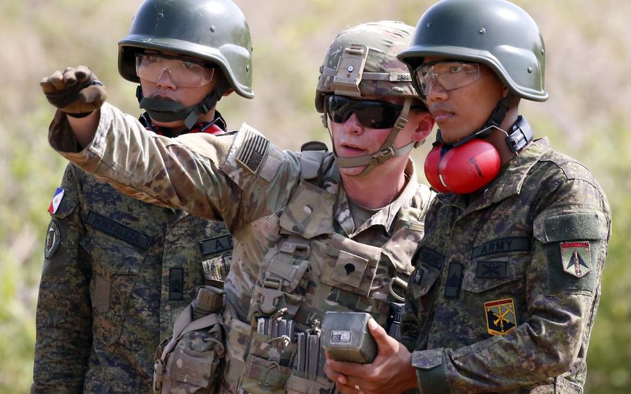 U.S. and Filipino soldiers train together during the annual Salaknib exercise at Fort Magsaysay, Philippines, Friday, March 31, 2023.