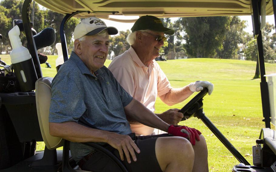 Dave Szumowski (left) and Dan Williams (right) share a laugh at the Coronado Golf Course in Coronado, Calif., on July 28, 2021.