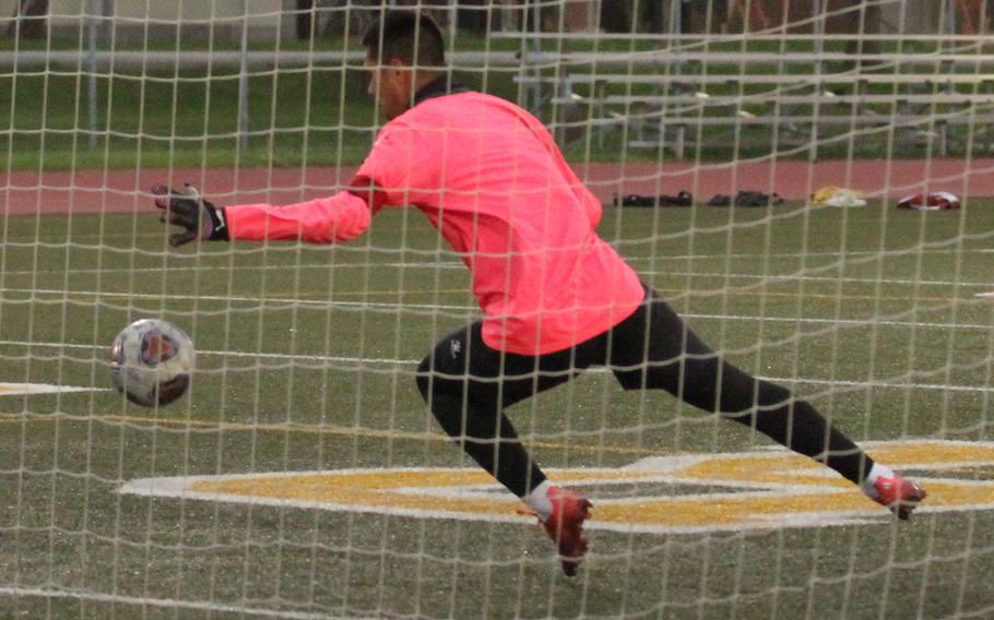 King keeper Kent Monto makes one of his 19 saves against Perry.
