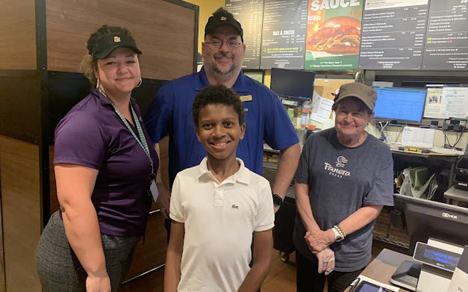 Harrison Johnson thanks staff at his local Panera Bread after a fundraising event. 