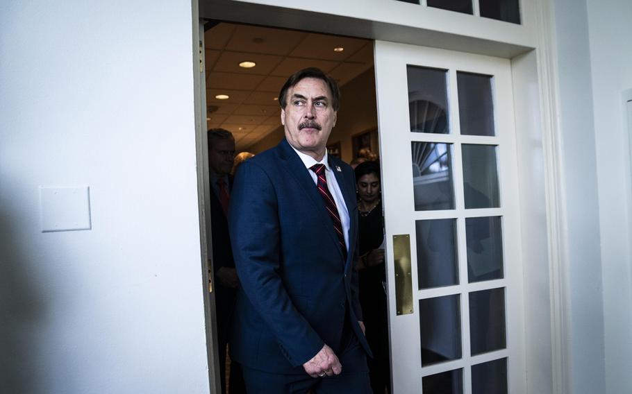 MyPillow CEO Mike Lindell walks out ahead of President Donald Trump for a White House briefing in March 2020. Lindell organized a Jan. 4, 2021, meeting at the Trump International Hotel about allegations of election fraud. 