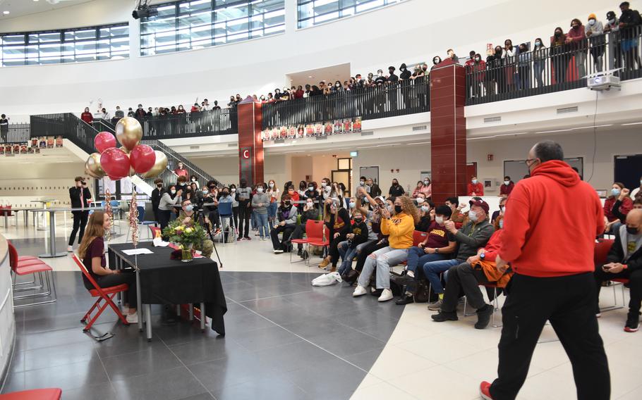 Kaiserslautern High School senior Aiva Schmitz signed a letter of intent on Wednesday, Nov. 10, 2021, to play tennis for the University of Minnesota. Scores of students and teachers attended a signing ceremony for Schmitz.