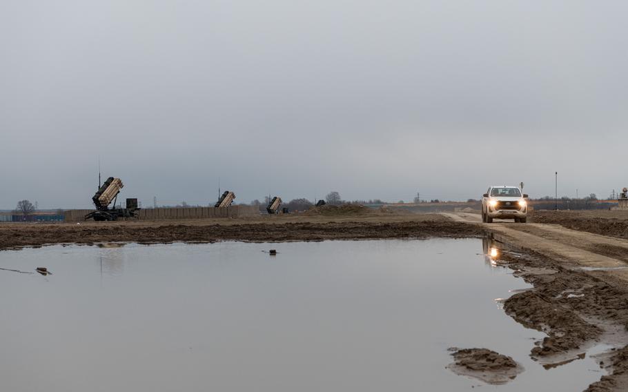 Patriot missile launchers tower above the muddy landscape at Delta Battery’s location in southeastern Poland on March 6, 2023. The unit has been operating in the austere environment for over a year. 