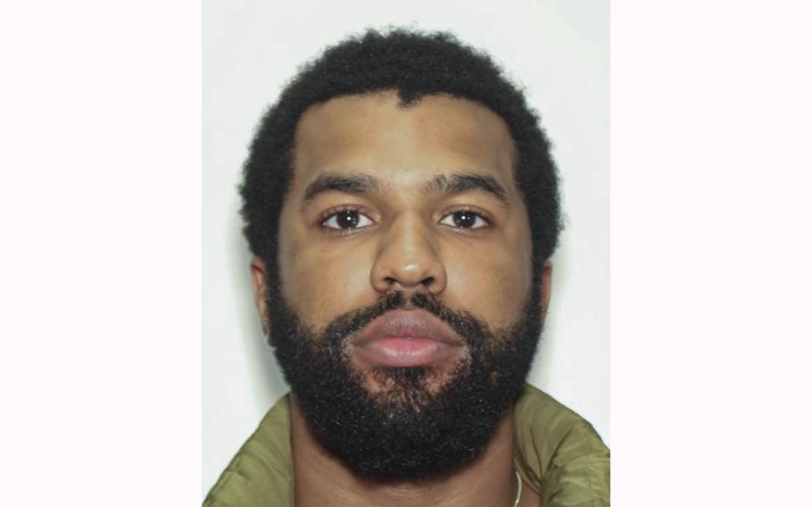 Coast Guard veteran Deion Patterson as seen in a police booking mugshot. 