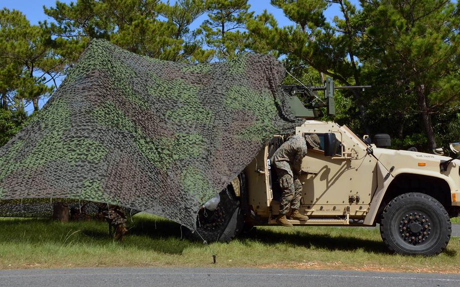 A member of 3rd Battalion, 12th Marine Regiment provides security during the Noble Jaguar exercise at Central Training Area, Okinawa, Thursday, Sept. 30, 2021.