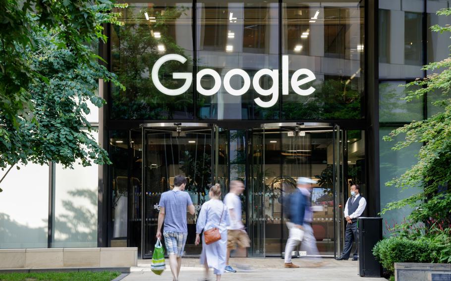 Commuters outside the Google offices in the King’s Cross Central development in London, U.K., on Monday, July 19, 2021. Boris Johnson’s plan to get the U.K. back to normal is in disarray, with Covid-19 cases rising the most in the world and a public outcry over the prime minister’s perceived attempt to dodge isolation rules. 