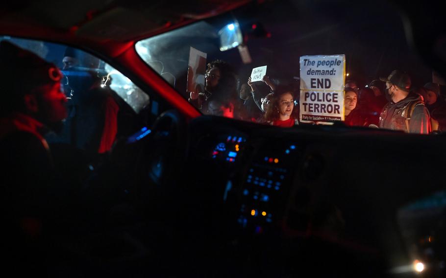 Demonstrators protest the killing of Tyre Nichols along Riverside Drive on Jan. 27 in Memphis.