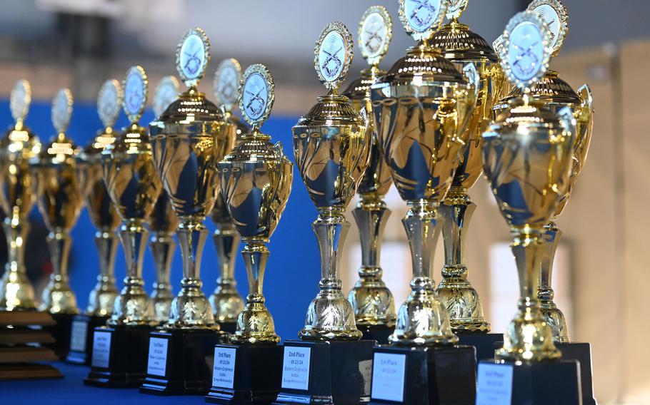 The trophies are lined up before the awards ceremony at the DODEA-Europe marksmanship championship at Ansbach Middle High School on Jan. 27, 2024. 