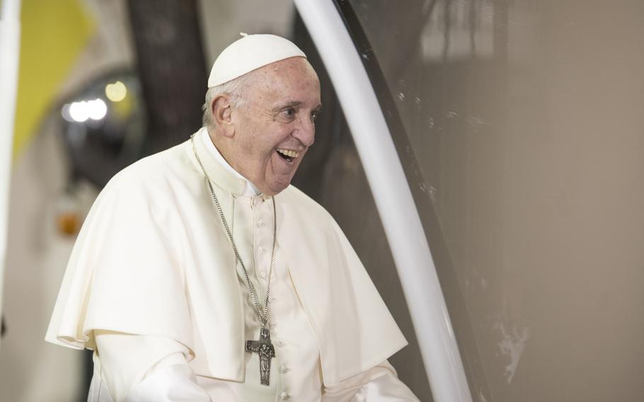 Pope Francis smiles at supporters outside the Vatican Apostolic Nunciature in Santiago, Chile, on Jan. 15, 2018. 