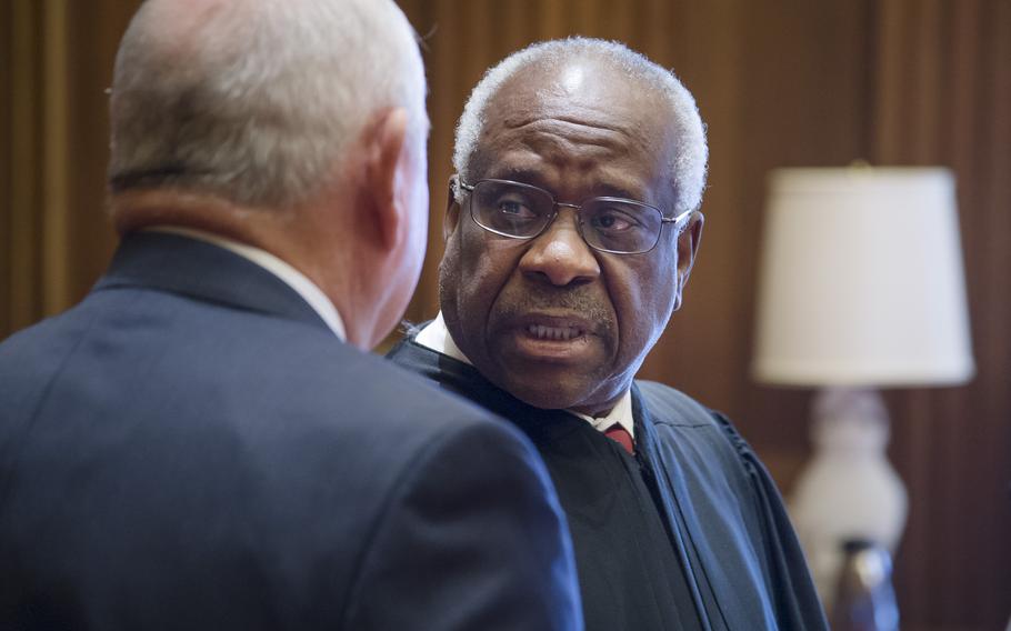 Sonny Perdue is sworn in as the 31st Secretary of Agriculture by U.S. Supreme Court Justice Clarence Thomas with his wife Mary and family April 25, 2017, at the Supreme Court in Washington, D.C.