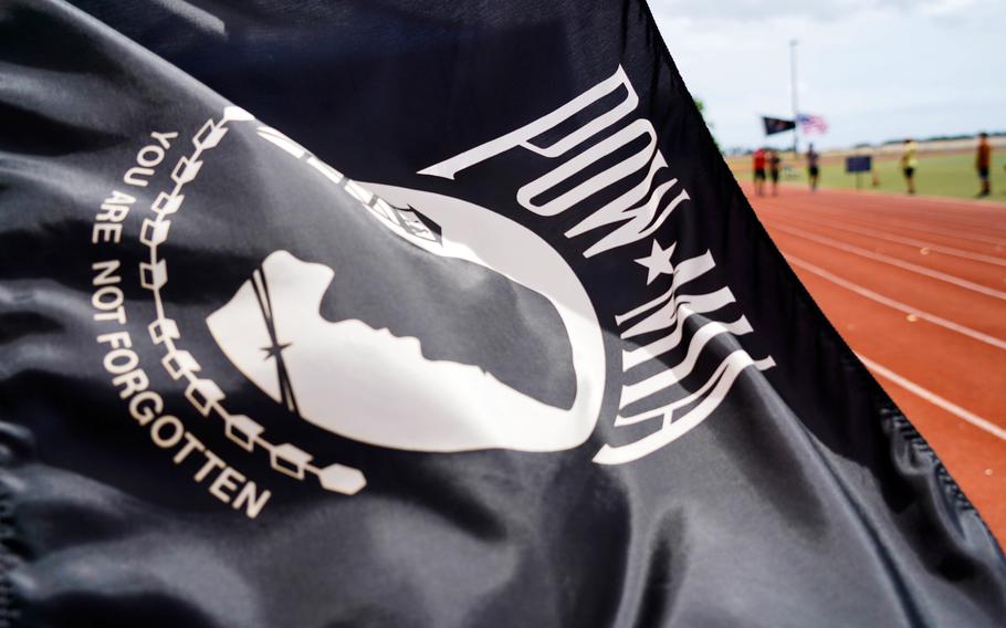 A POW/MIA flag flutters in the wind at Joint Base Pearl Harbor-Hickam, Hawaii, Sept. 16, 2021.