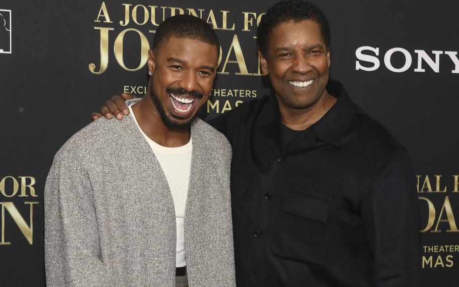 Actor Michael B. Jordan, left, and director Denzel Washington attend the Dec. 9 world premiere of “A Journal for Jordan” at AMC Lincoln Square in New York. 