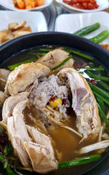 Palace Black Hoof Mushroom Samgyetang uses a whole young chicken stuffed with a ball of herb-infused rice.