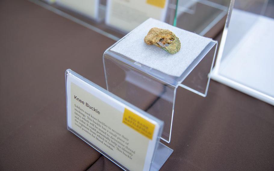 A suspected knee buckle from a Hessian soldier’s uniform found at a Rowan University archaeological dig site on display in National Park, N.J., on Tuesday, Aug. 2, 2022. 
