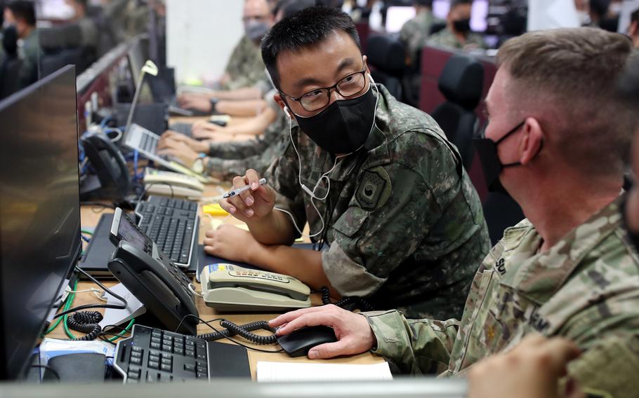 Service members from U.N. Command, Combined Forces Command and U.S. Forces Korea work during the 11-day Ulchi Freedom Shield exercise in South Korea, Aug. 22, 2022.