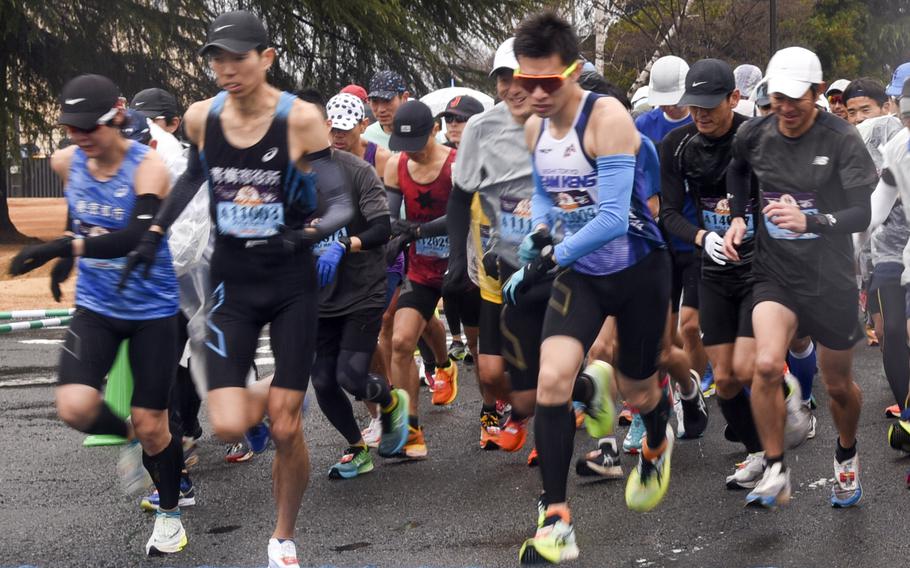 The half-marathon event was a soggy one this year during the 43rd annual Yokota Striders Frostbite Road Race at Yokota Air Base, Japan, Sunday, Jan. 21, 2024. 