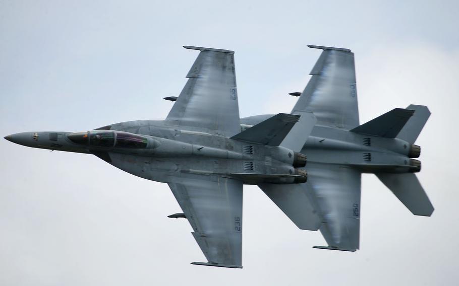 F18s perform a daring maneuver during the annual NAS Oceana Air Show, Sept. 19, 2020. Last year the show went on but without an audience.