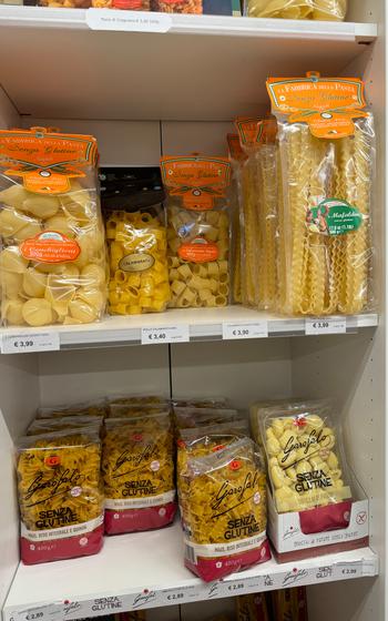 Various shapes like spirals and shells of GF pasta
