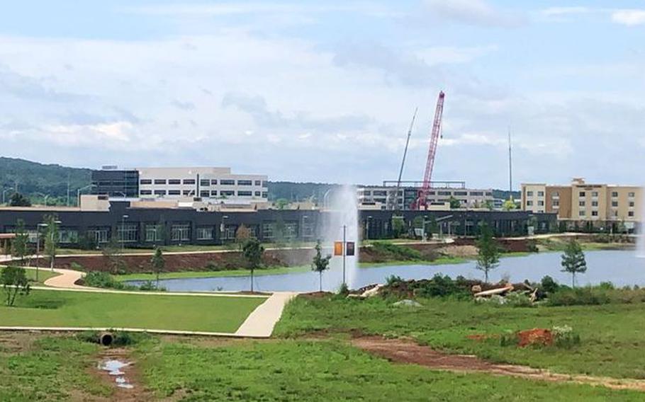 Buildings rise in a new office complex just outside the main gate of Redstone Arsenal in Huntsville, Ala. The complex is called Redstone Gateway and it features office buildings, lab and research space, stores, restaurants and hotels.