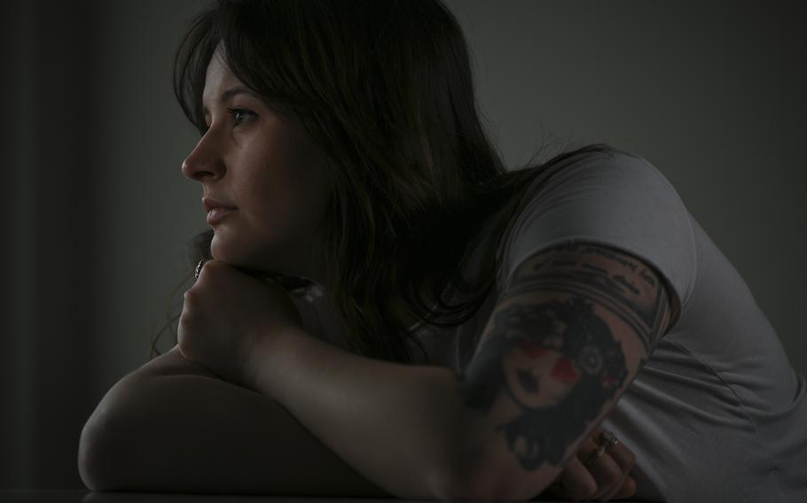 Miranda Powell, 28, at her home in Rosslyn, Va. Powell was a Navy corpsman who paid a for-profit company $8,000 to help her increase her disability benefits after she left the military. She says the firm took advantage of her and used predatory tactics. 